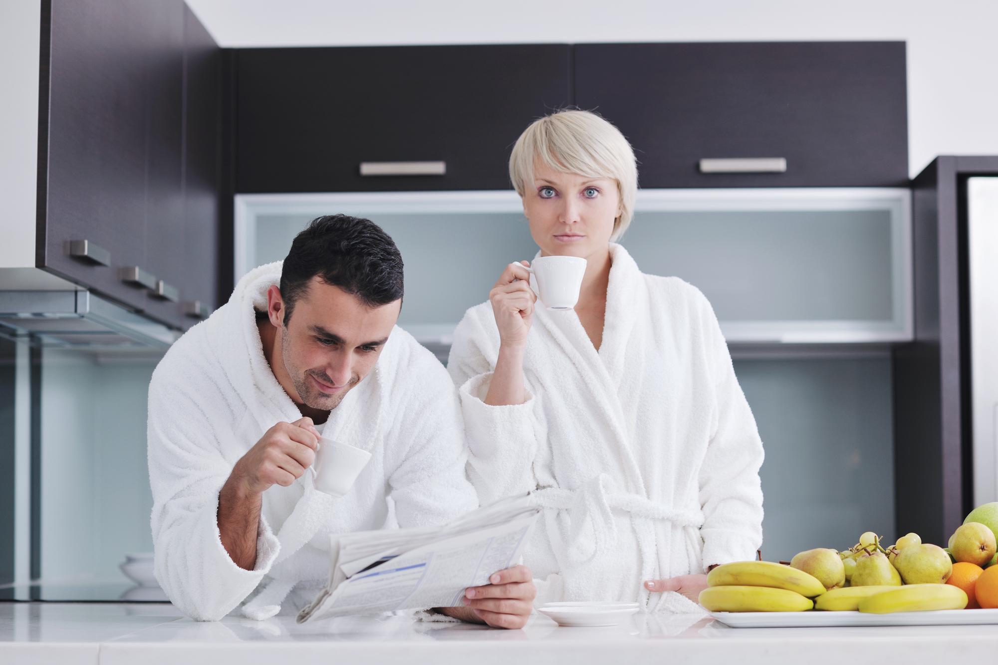 Consultant discussing labeling with chef in kitchen